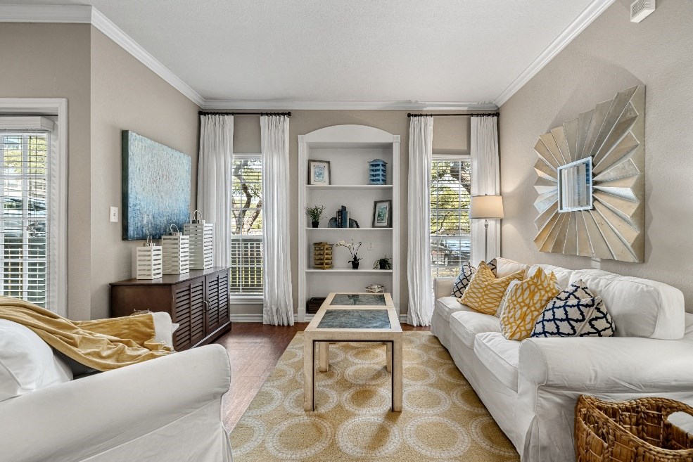 a living room with two couches and a coffee table
