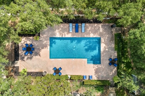 arial view of a house with a swimming pool