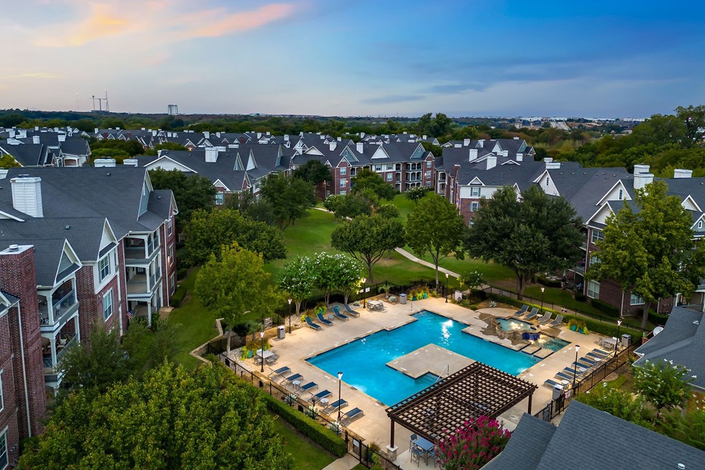 an aerial view of a swimming pool at the resort with houses