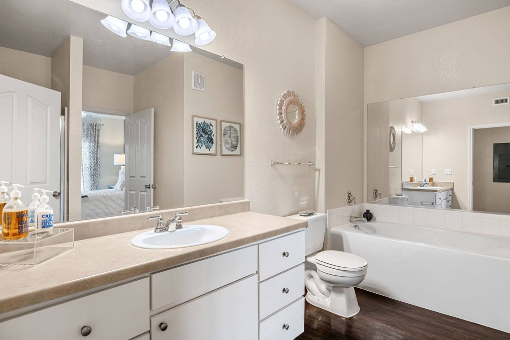 a bathroom with a sink toilet and bathtub