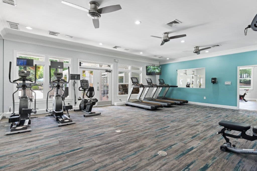 the gym in the owner s suite is equipped with cardio equipment and weights