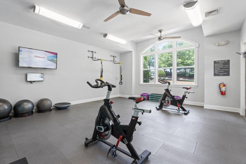 exercise equipment in the gym at the monarch club apartments