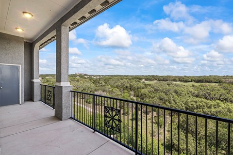 Large balcony with scenic views.