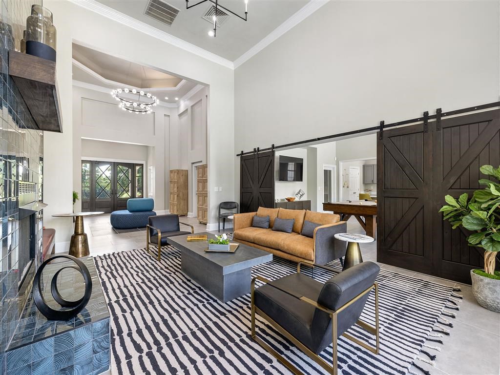 a living room with a couch and a table