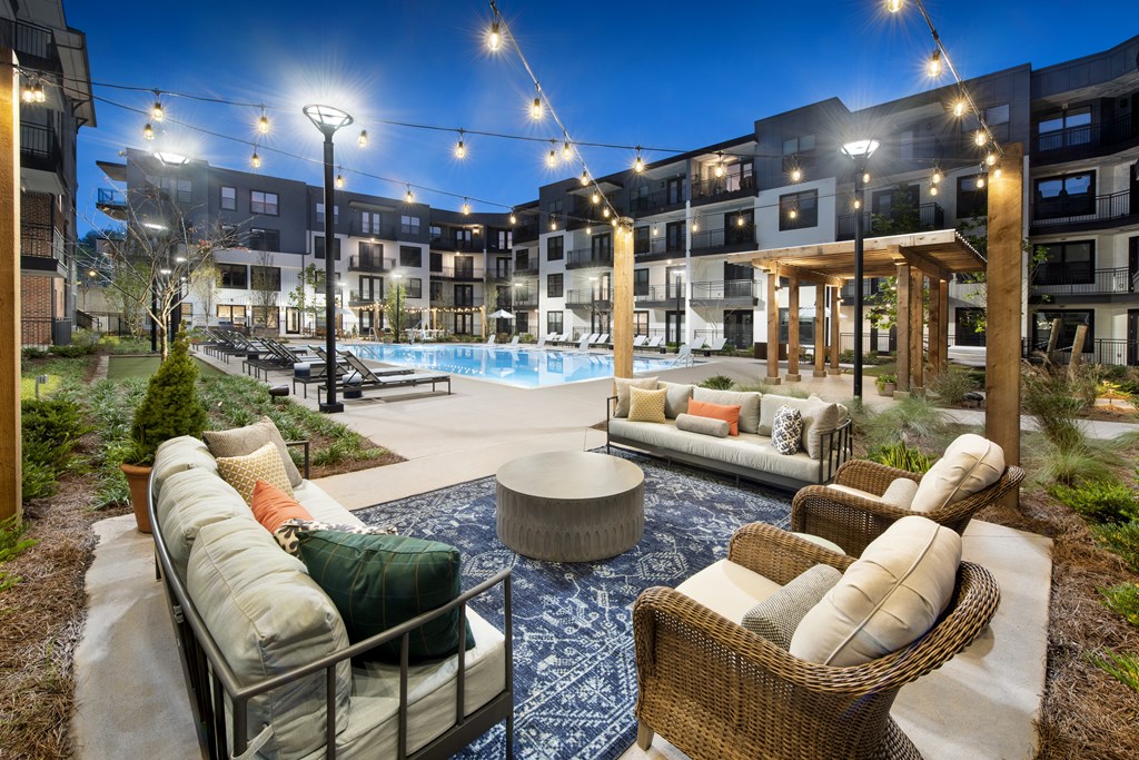 the residence apartment building pool area at night
