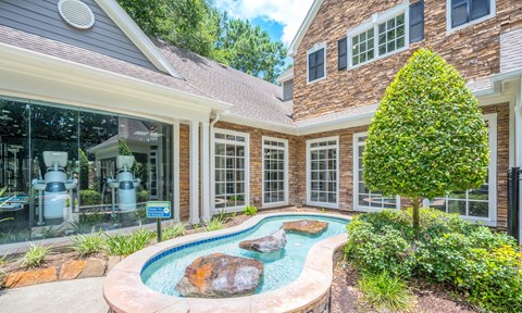 A house with a pool in the backyard.