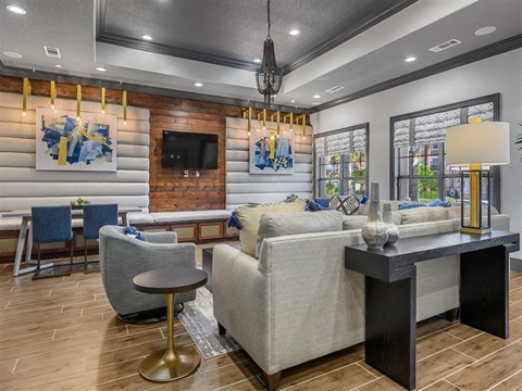 a living room with a couch and a table