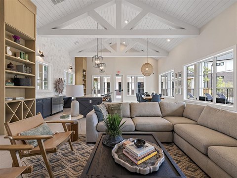a living room with couches and a coffee table