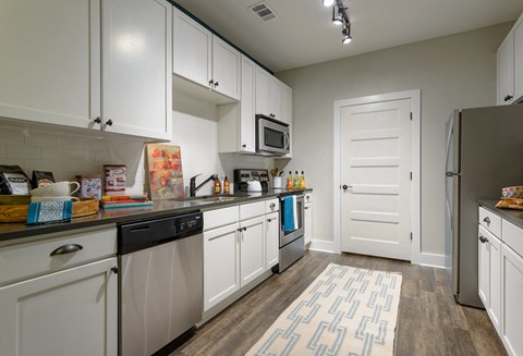 kitchen with white cabinets and stainless steel appliances