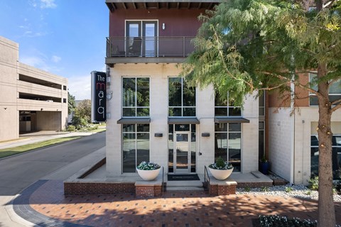 The entrance to a building with a sign that says "The Terrace".