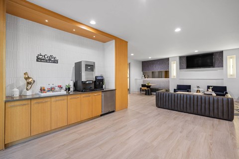 A coffee shop with a counter and a couch.