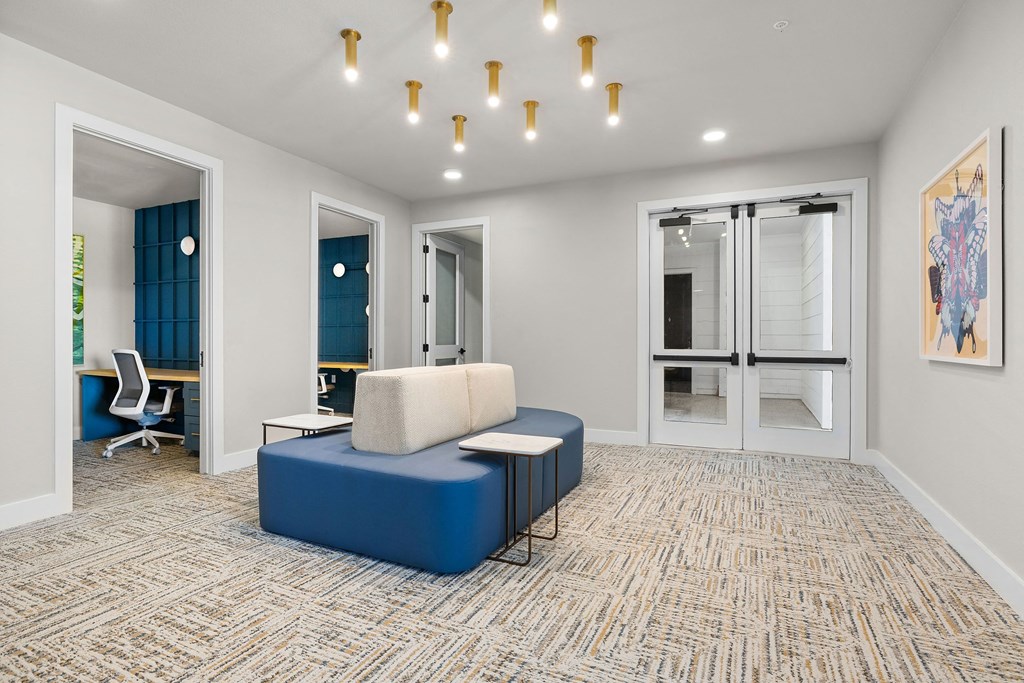 a living room with a blue couch