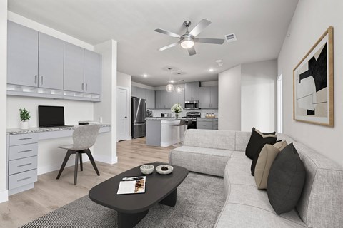a living room with a couch and a table