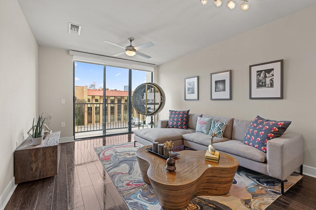 a living room with a couch and a table