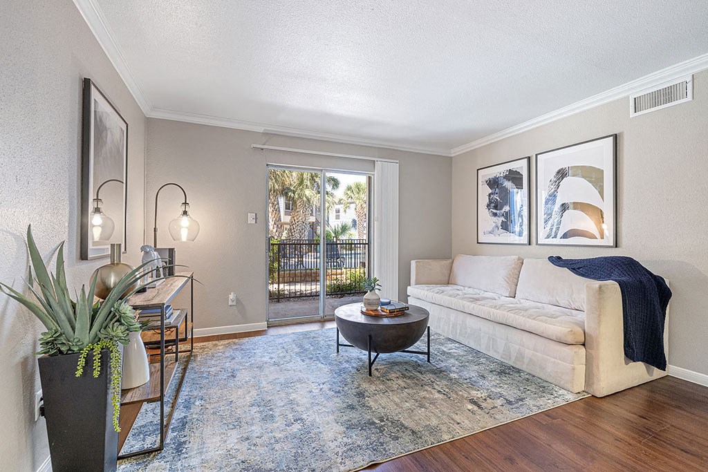 a living room with a couch and a table