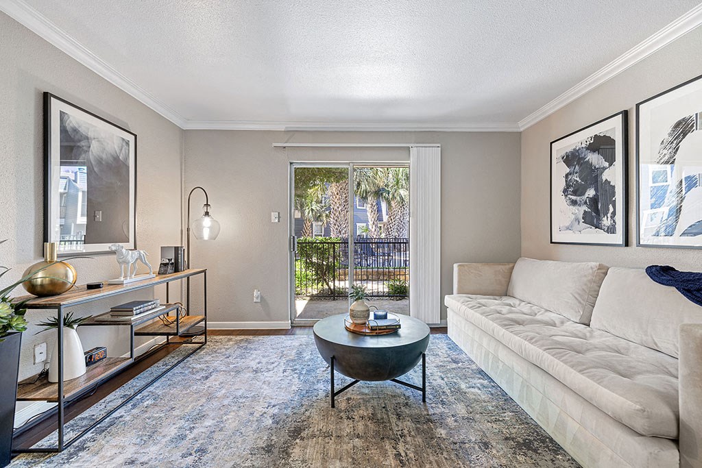 a living room with a couch and a table