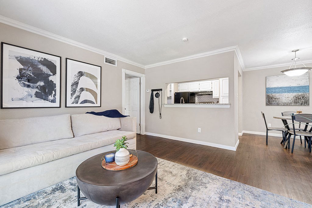 a living room with a couch and a table