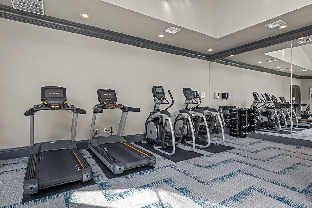 the gym at the monarch luxury apartments in des moines ia