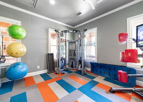 the gym at the monarch apartments