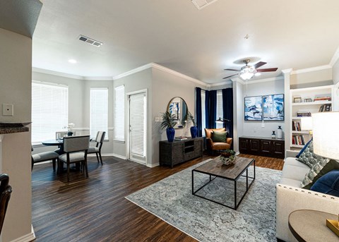 a living room with a couch and a table