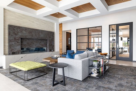 a living room with a couch and a fireplace