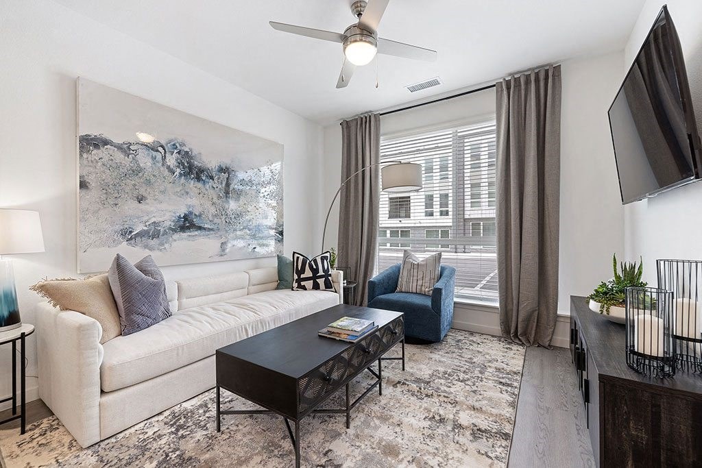 a living room with a couch and a table