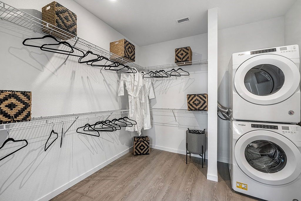 a laundry room with a washing machine and a dryer