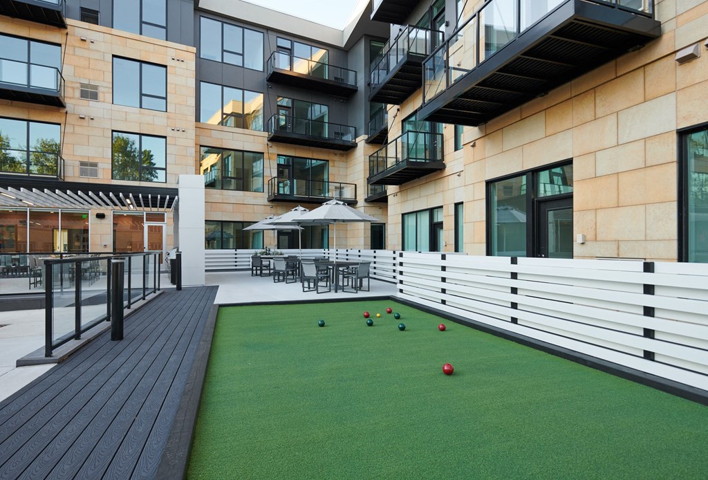 bocce ball court at the district flats apartments in lenexa