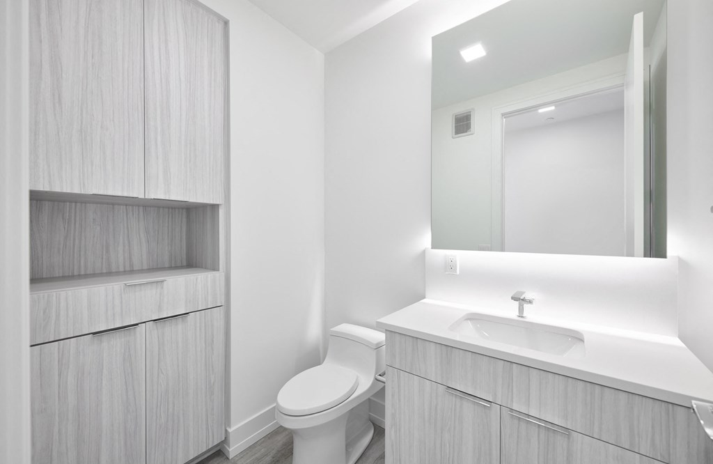 a bathroom with a toilet and a sink