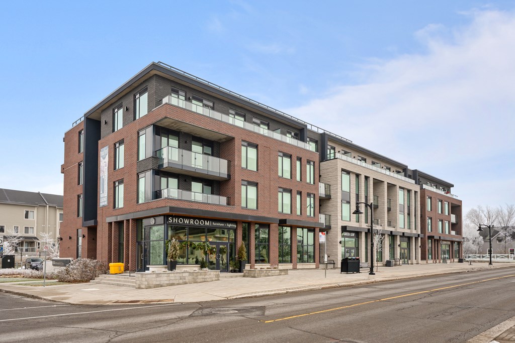 A multi-story building with the name "SHOWGROUND" on the front.