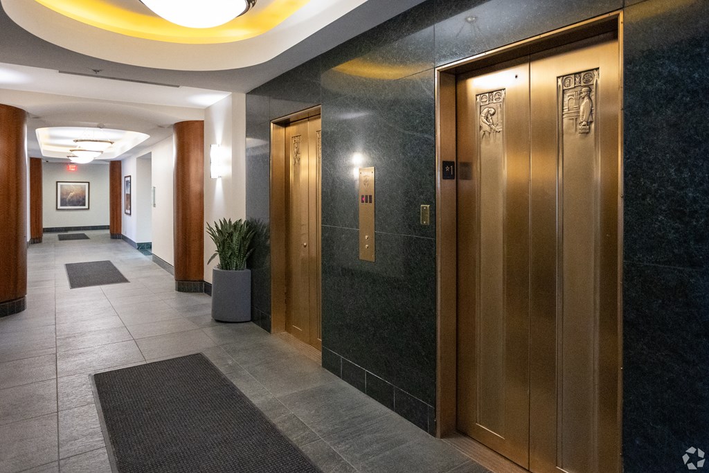 two elevators in the lobby of a building