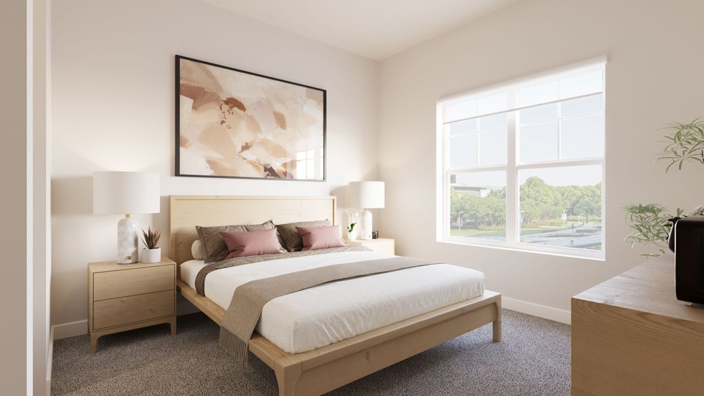 A bedroom with a large bed, nightstand, and a painting on the wall. A bedroom with a large bed, nightstand, and a painting on the wall.at The Landing at Hub City, Plymouth, WI
