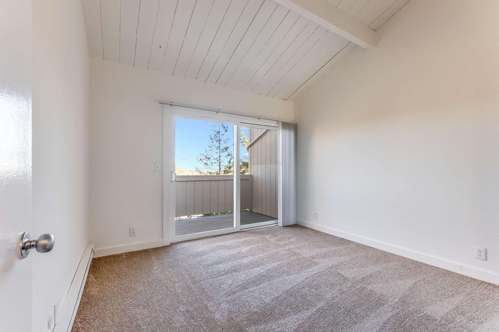 bedroom with sliding glass door
