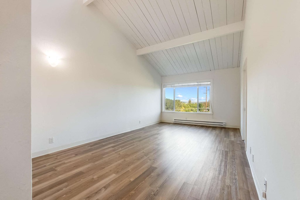living room with vaulted ceiling