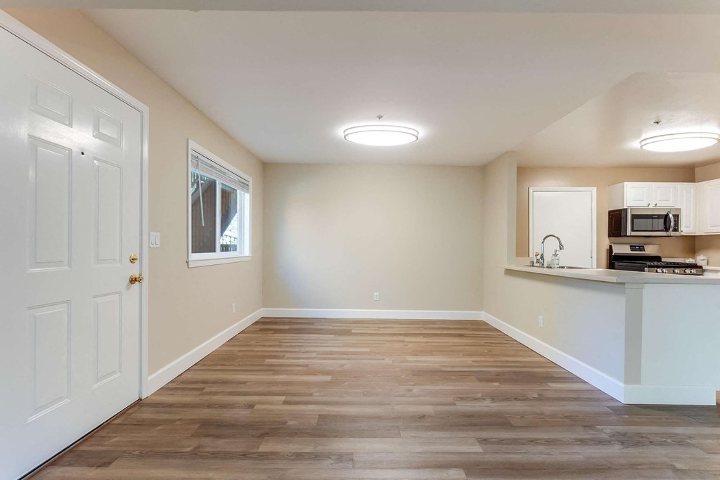 dining room with partial view of kitchen
