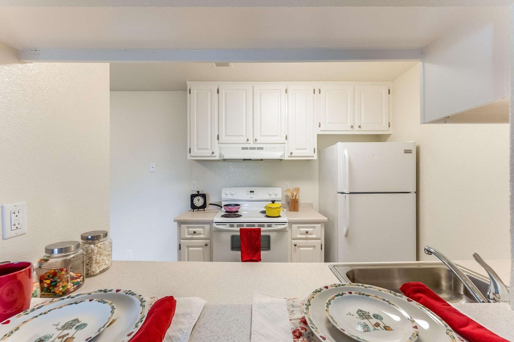 view of kitchen with stove and fridge