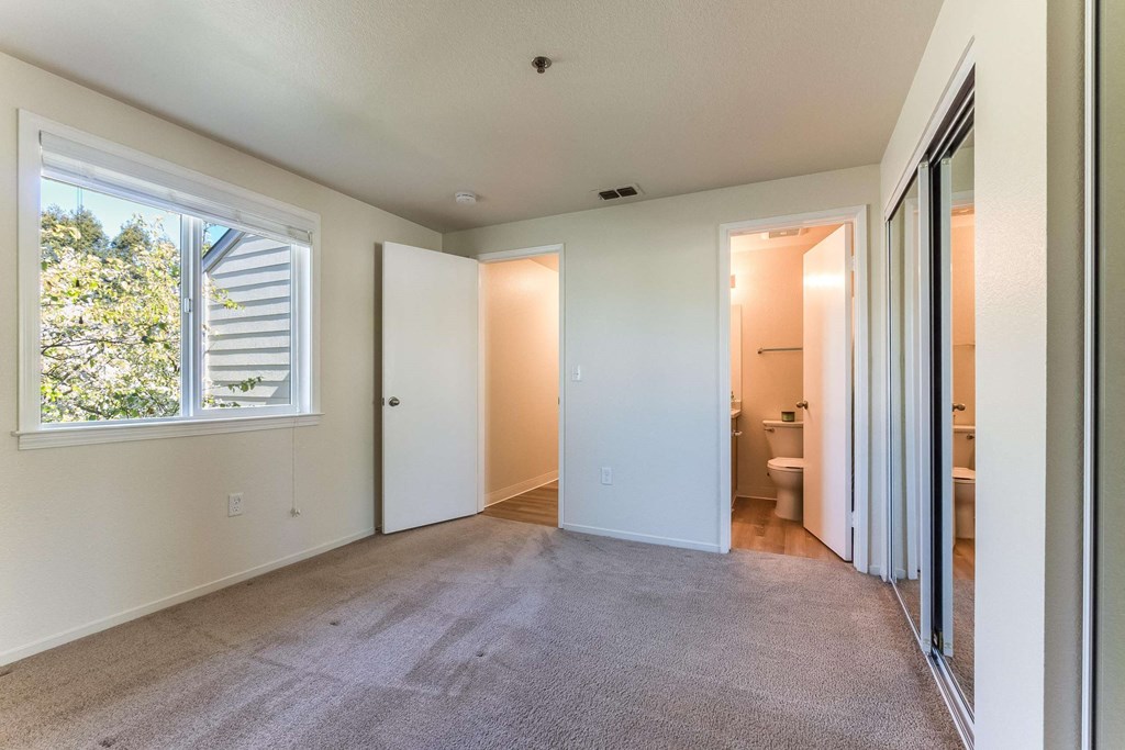 master bedroom with view of bathroom entrance