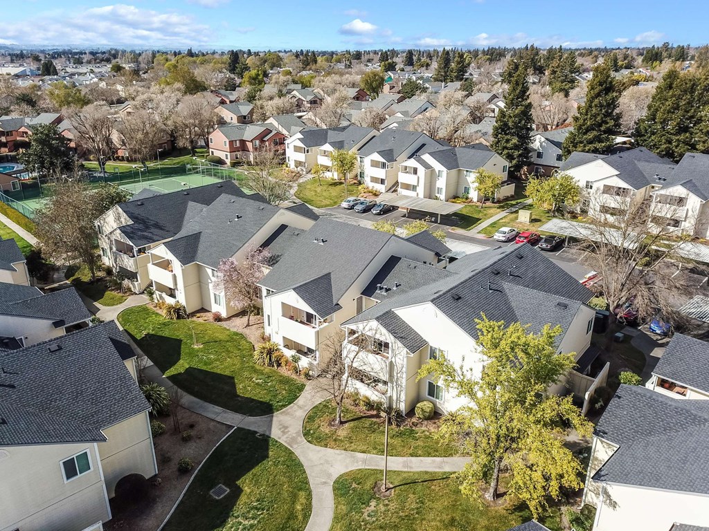 aerial view of apartments and lawn