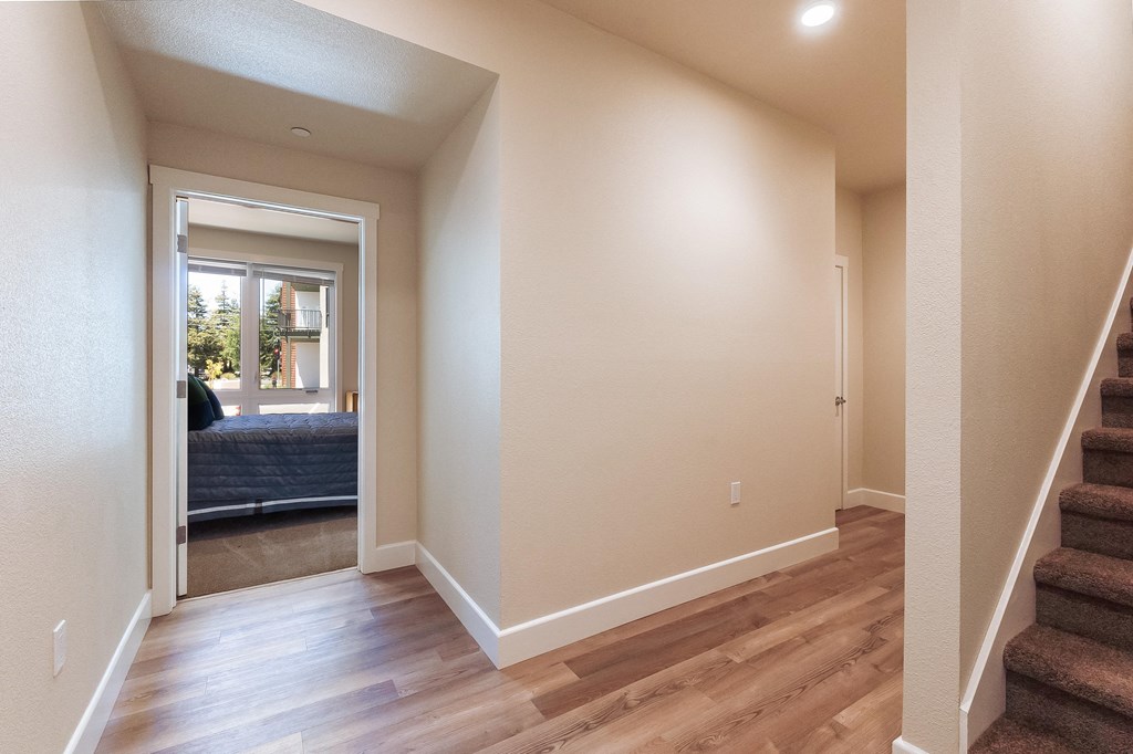 2 bedroom - entry view of bedroom and door to attached garage