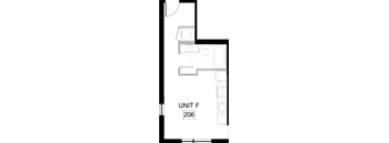 a floor plan of a room with a desk and a chair