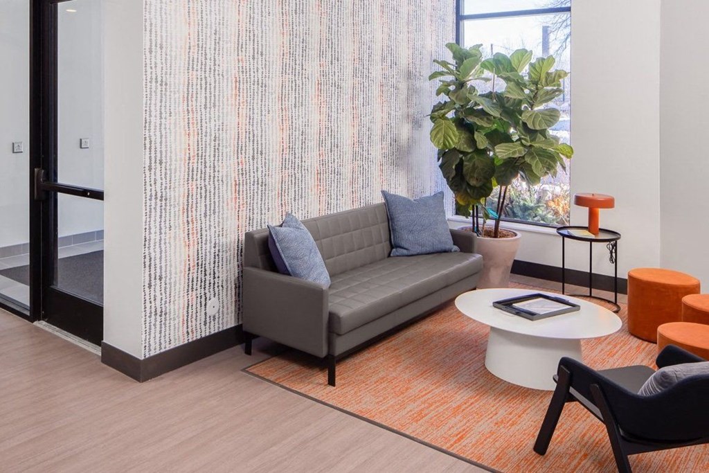 a living room with a couch and a table