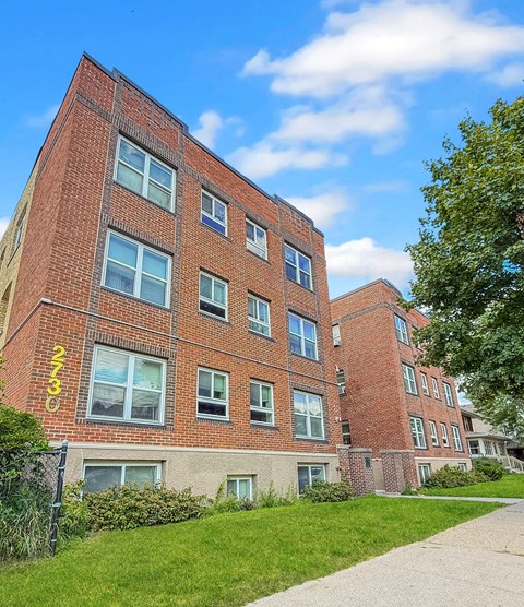A red brick building with the number 2333 on it.