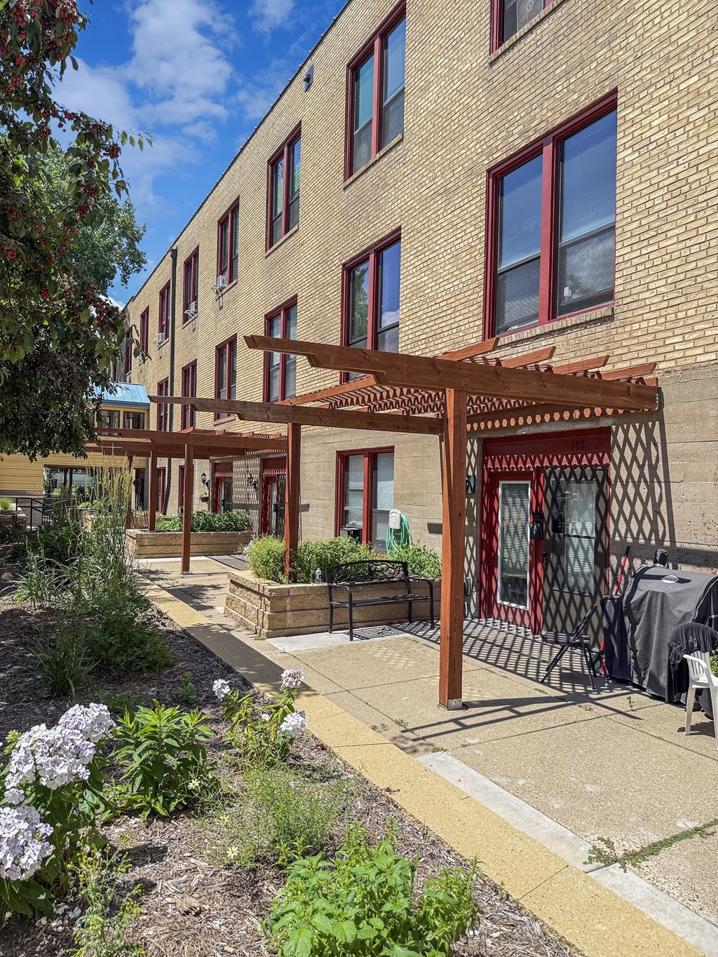 A building with a red and white striped awning.