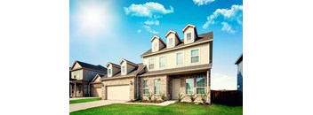 a house with two dormer windows and two garage doors