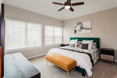Bedroom With Ceiling Fan at The Residences at Rayzor Ranch, Denton, TX