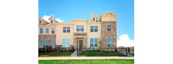 a large house with a fence in front of it