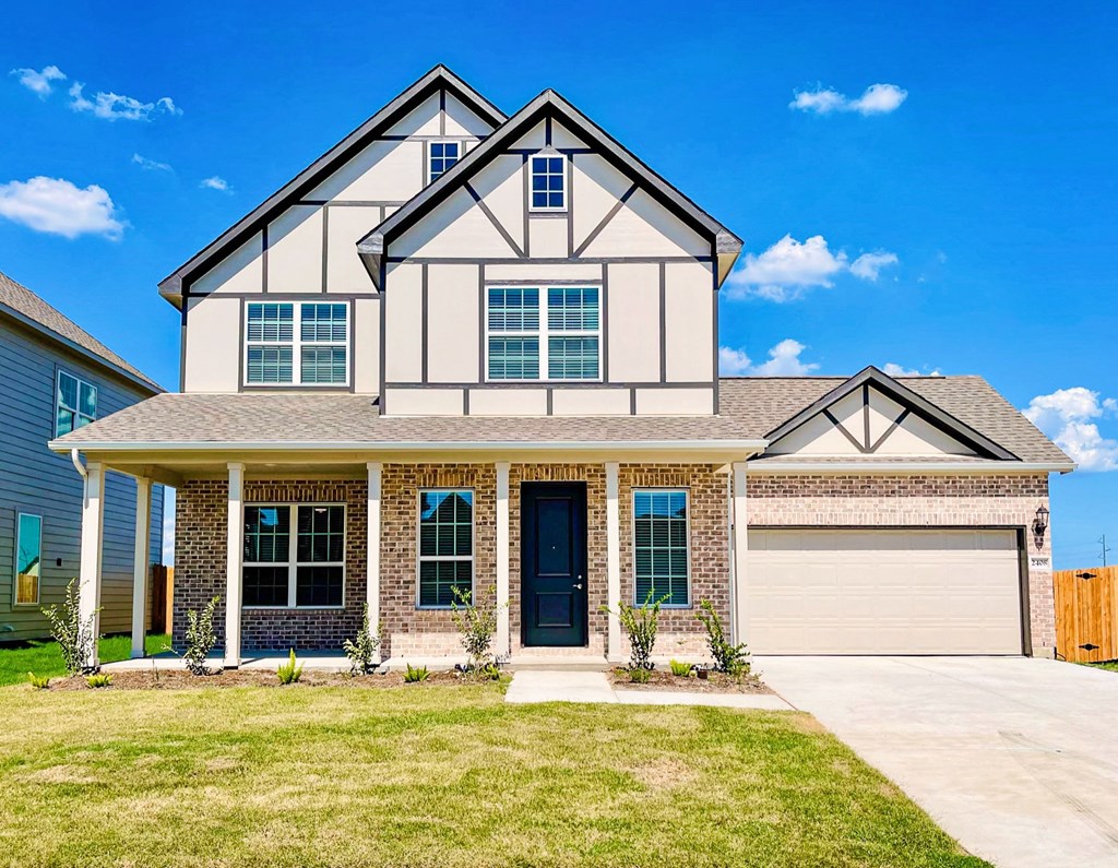 Building exterior view with pathway Building exterior view with pathway at The Residences at Rayzor Ranch, Texas, 76207
