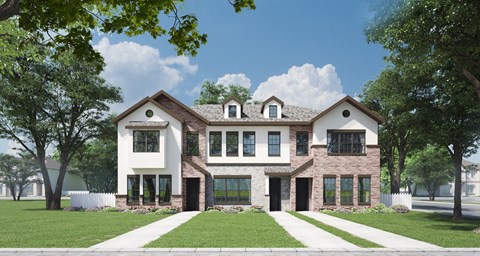 A large white house with a brown roof and a black door.