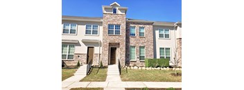 a home with brick and stone exterior