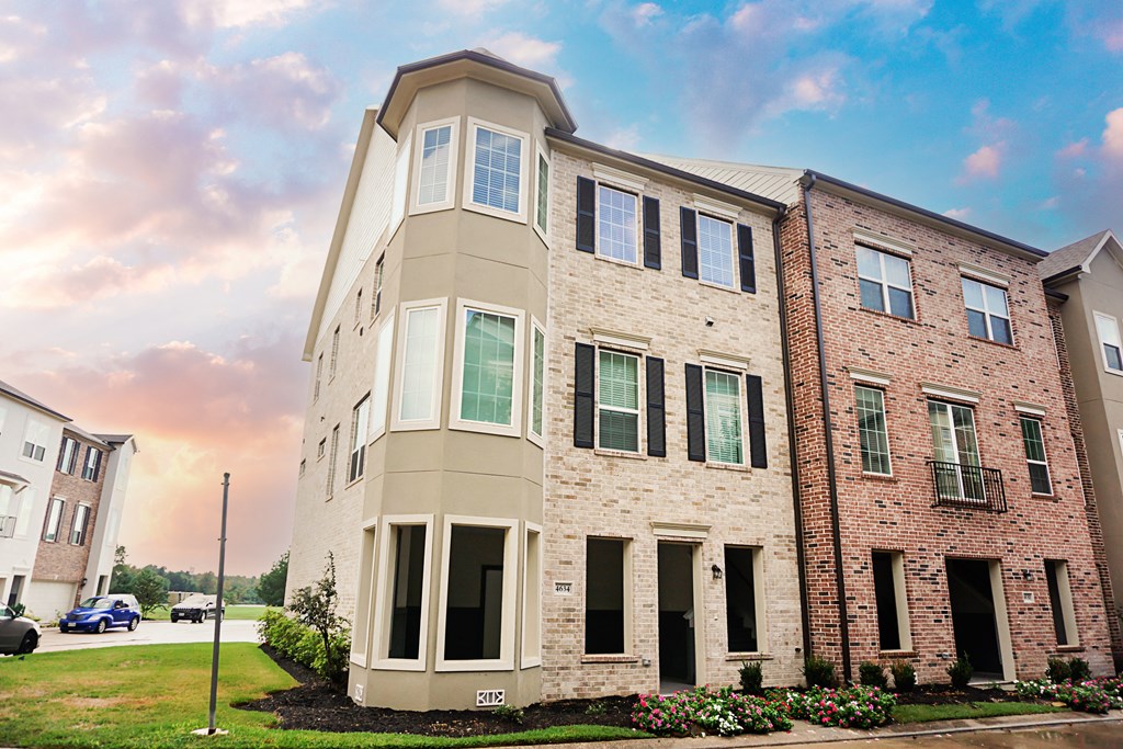 a large brick building with a tower on top of it